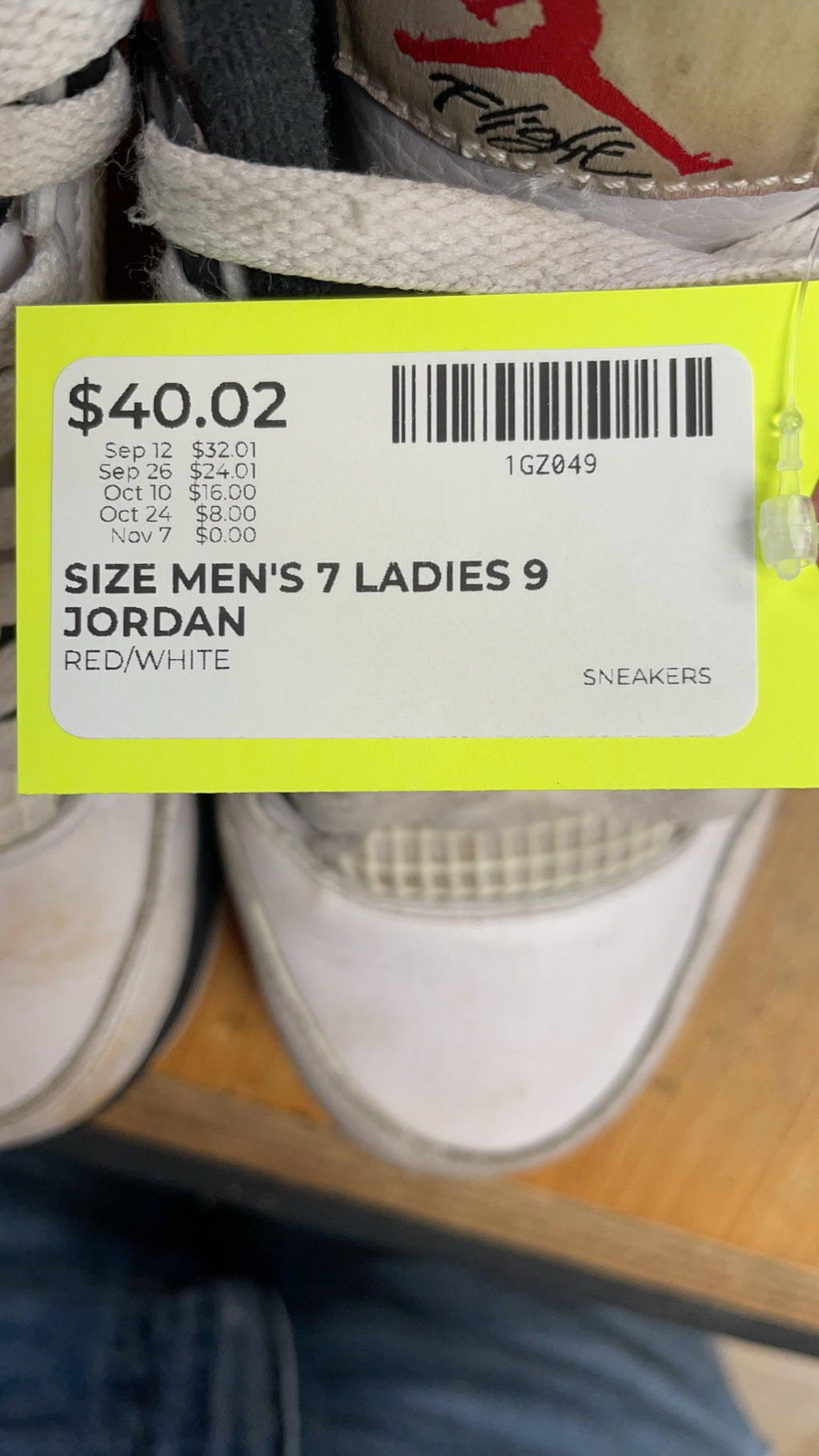 Jordan 4 Men's 7 Ladies 9 Red/White Sneakers