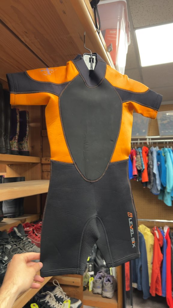 Level Six Junior Size 6 Shortie Wetsuit - Orange/Black