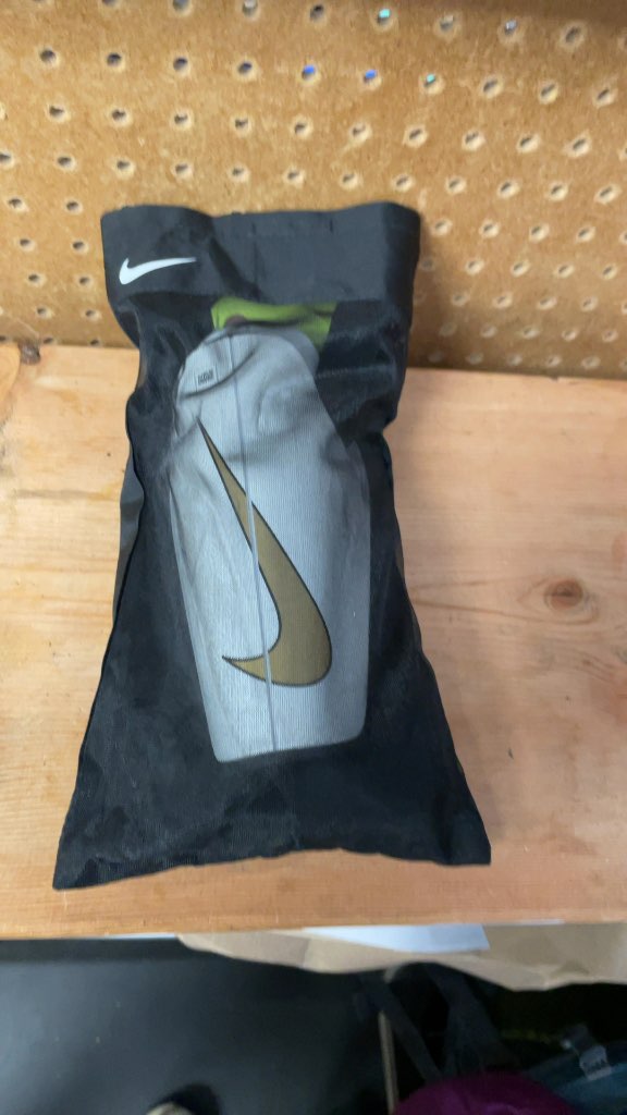 Nike Charge Shin Guards with Bag